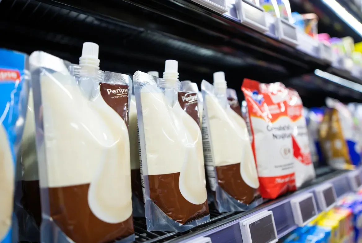transparent yogurt spout pouch on the shelf
